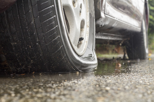 Flat tire change service in Central, Michigan